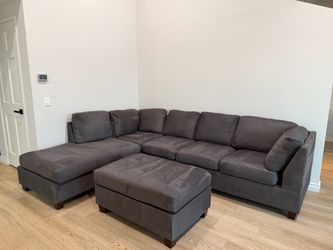 L shaped couch + Ottoman