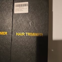 Hair trimmer professional with attachments and charging cord
