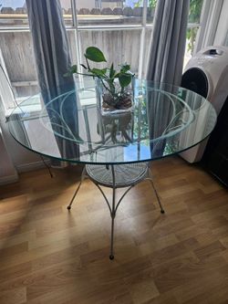 Glass top metal table