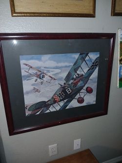 Framed German Fokker Triplane in a dogfight with a British fighter