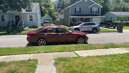 Burgundy Mercedes  S500