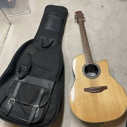 Ovation Vinyl Backed Acoustic Guitar And Case 