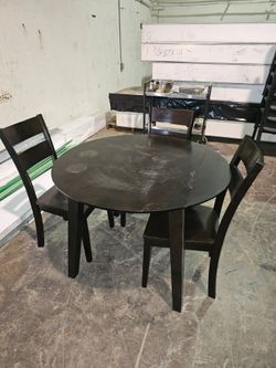 Table and three chairs