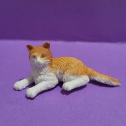 Safari LTD Domestic orange and white cat pvc figure.
