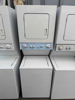 Kenmore electric 120 volts regular outlet stackable washer and dryer 24 inches