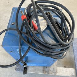 Miller  220V welding machine with a 100-feets  extension  extension
