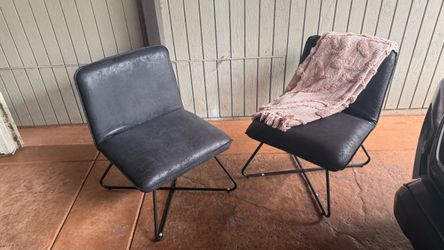 Black faux leather lounge chairs set of 2