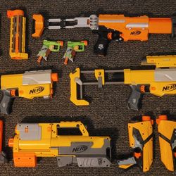 Bulk NERF blaster variety.