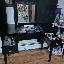 Makeup vanity with mirror