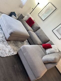 Beautiful grey sectional couch with ottoman