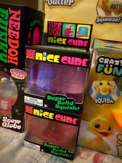 NeeDoh Nice Cube, Snow Globe, Funky Pup, and Giggle Zone Squishy Duck Bundle