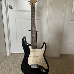 Squier Stratocaster by Fender + Guitar Stand