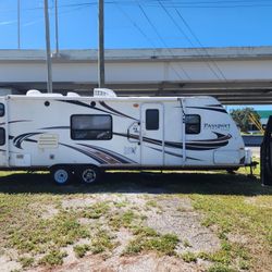 30' Passport ultralight by keystone, pull behind bunkhouse trailer