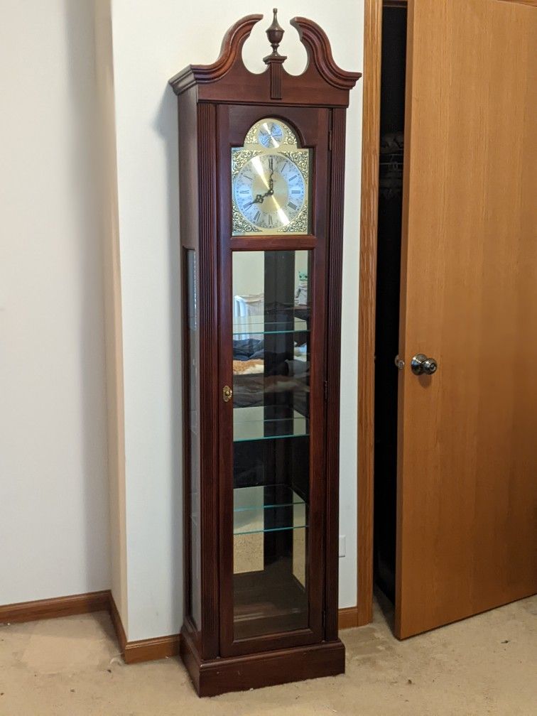 Howard Miller Tempus Fugit Curio Grandfathers Clock