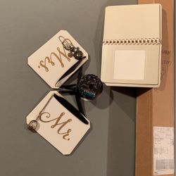 Wedding photo album and placeholder for Mr. and Mrs.