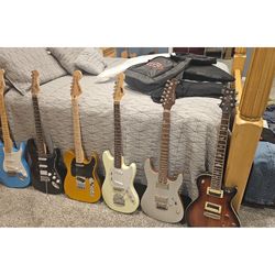 6 Guitars 1