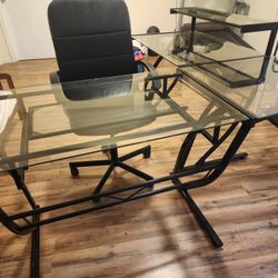Computer desk with rolling chair