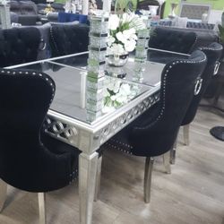 New dining table, lightly used, with 6 chairs, black color