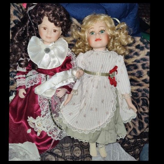 2 Beautiful Porcelain Dolls