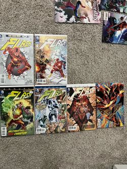 Various comic books, with variant issue covers.
