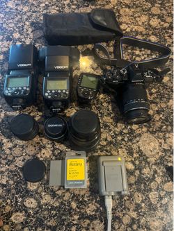 Olympus E-M10II (Negotiable)