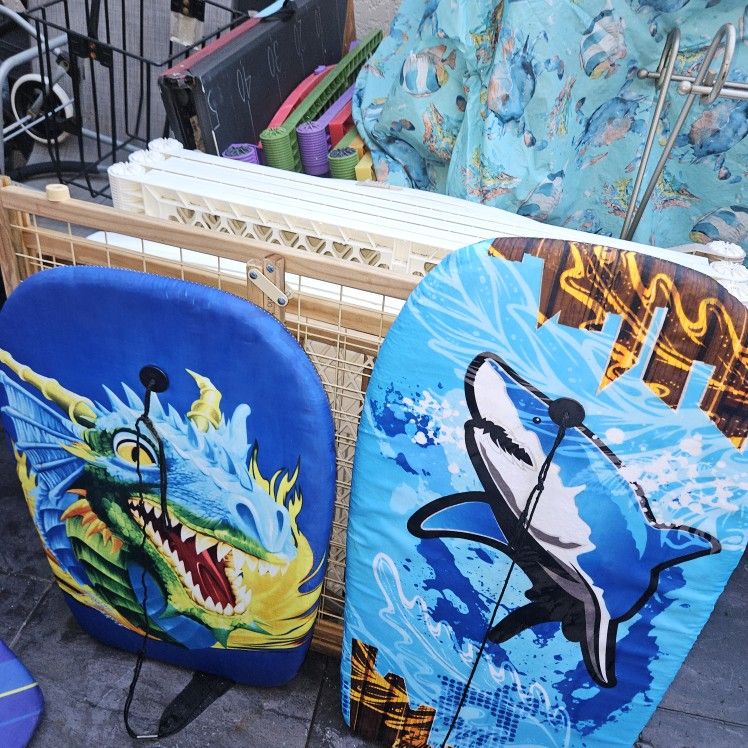 4 BOOGIE BOARDS. $5 AND $10