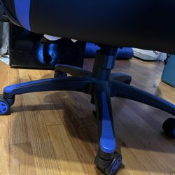Black/Blue Gaming chair with cushion and recline 