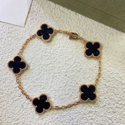 black and gold bracelet/anklet