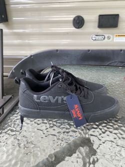 Brand new, black Levi’s shoes