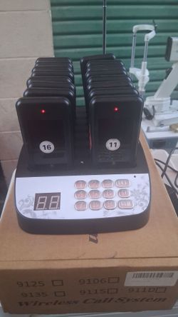 Wireless Paging System with 16 pagers.  Pages customers waiting to be seated.