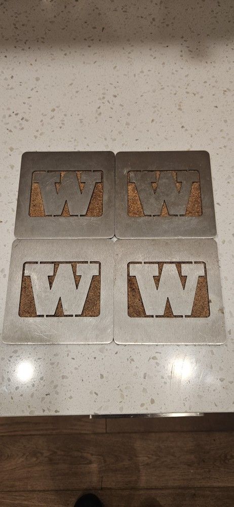 SET OF. 4. U of W COASTERS