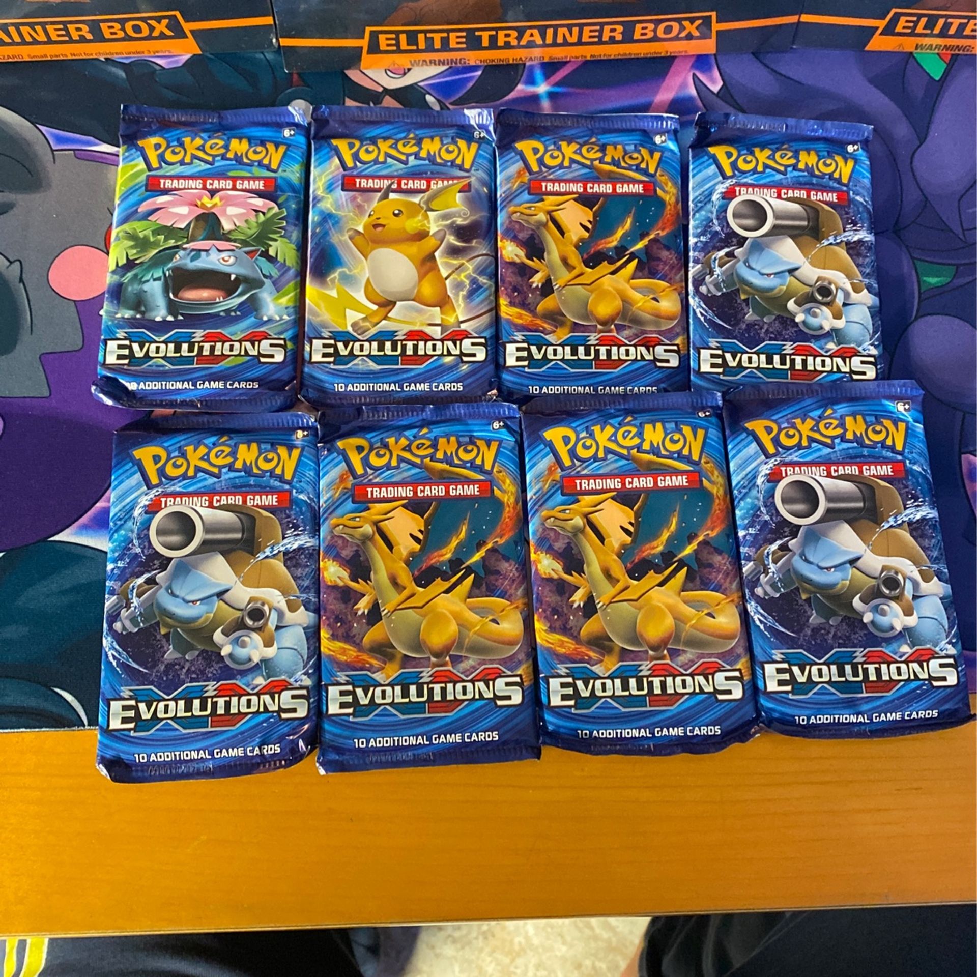 8 unopened and sealed Pokemon XY evolutions booster packs