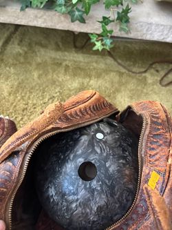 Ebonite Bowling Ball with Textured Brown Carry Bag