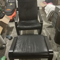 Black Leather Chair And Ottoman 50$