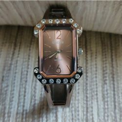 Chicos Rose/Copper Toned Fashion Quartz Cuff Watch With Rhinestone Accent
Fits small wrist
Beautiful Watch