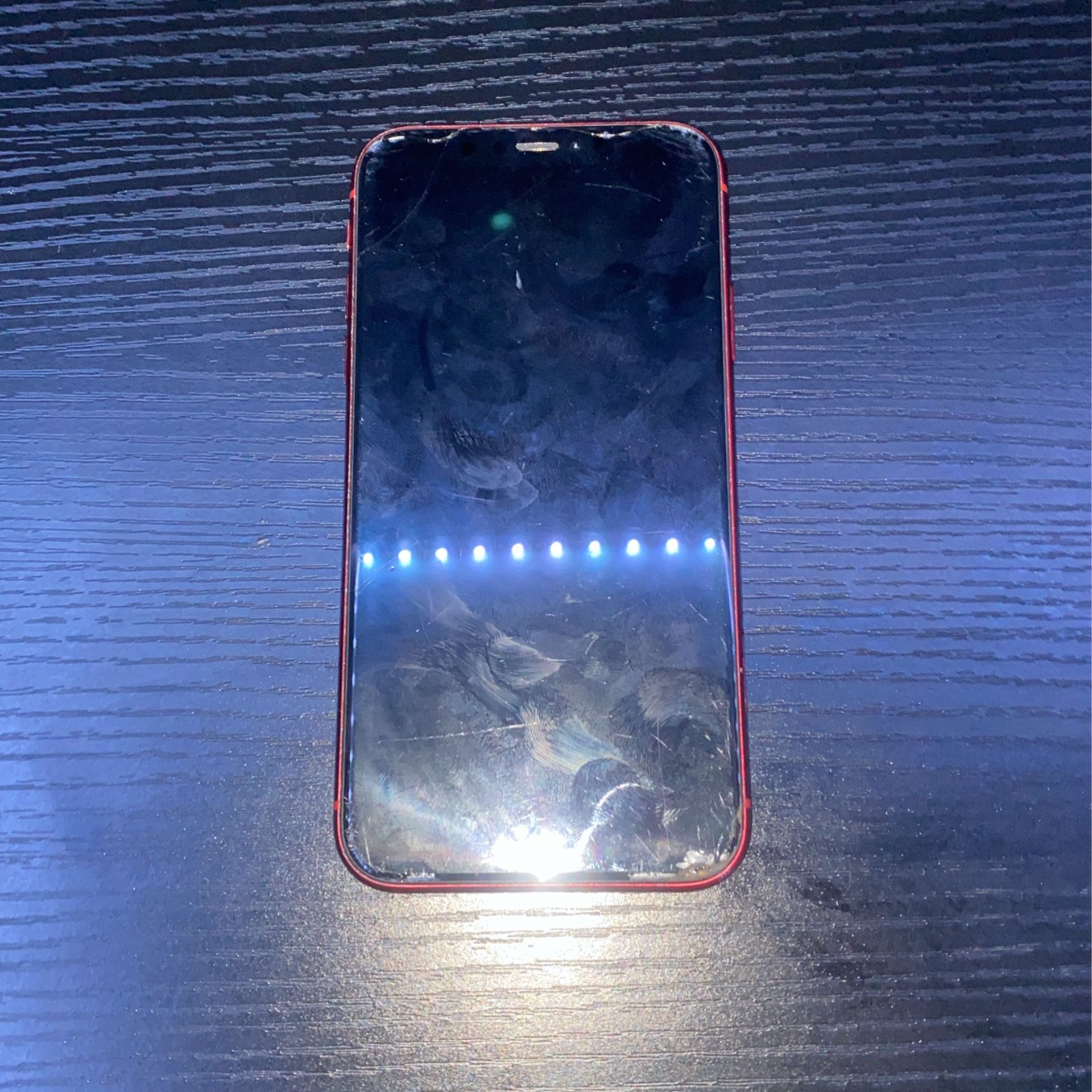iphone xr red (works brand new just has a few scratches and cracks)