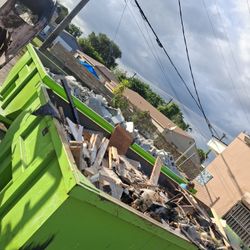 Fence , Dumpsters  Bobcat