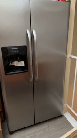 Stainless Steel Frigidaire double door refrigerator.