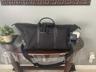 Coach black cabin bag