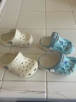2 Pairs of Baby Girls Crocs in great condition size 5
