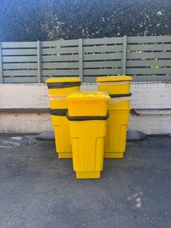 FREE yellow trash can containers with attached lids and wheels