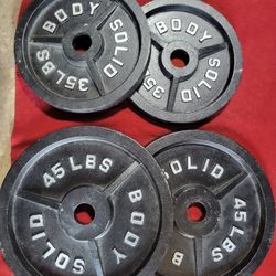 BODY SOLID 2" HOLE  OLYMPIC PLATES 160LBs.       2-45s.  2-35s 
11525 S HALSTED DUNKIN DONUTS/7111.S WESTERN WALGREENS 
135$  CASH ONLY AS IS 