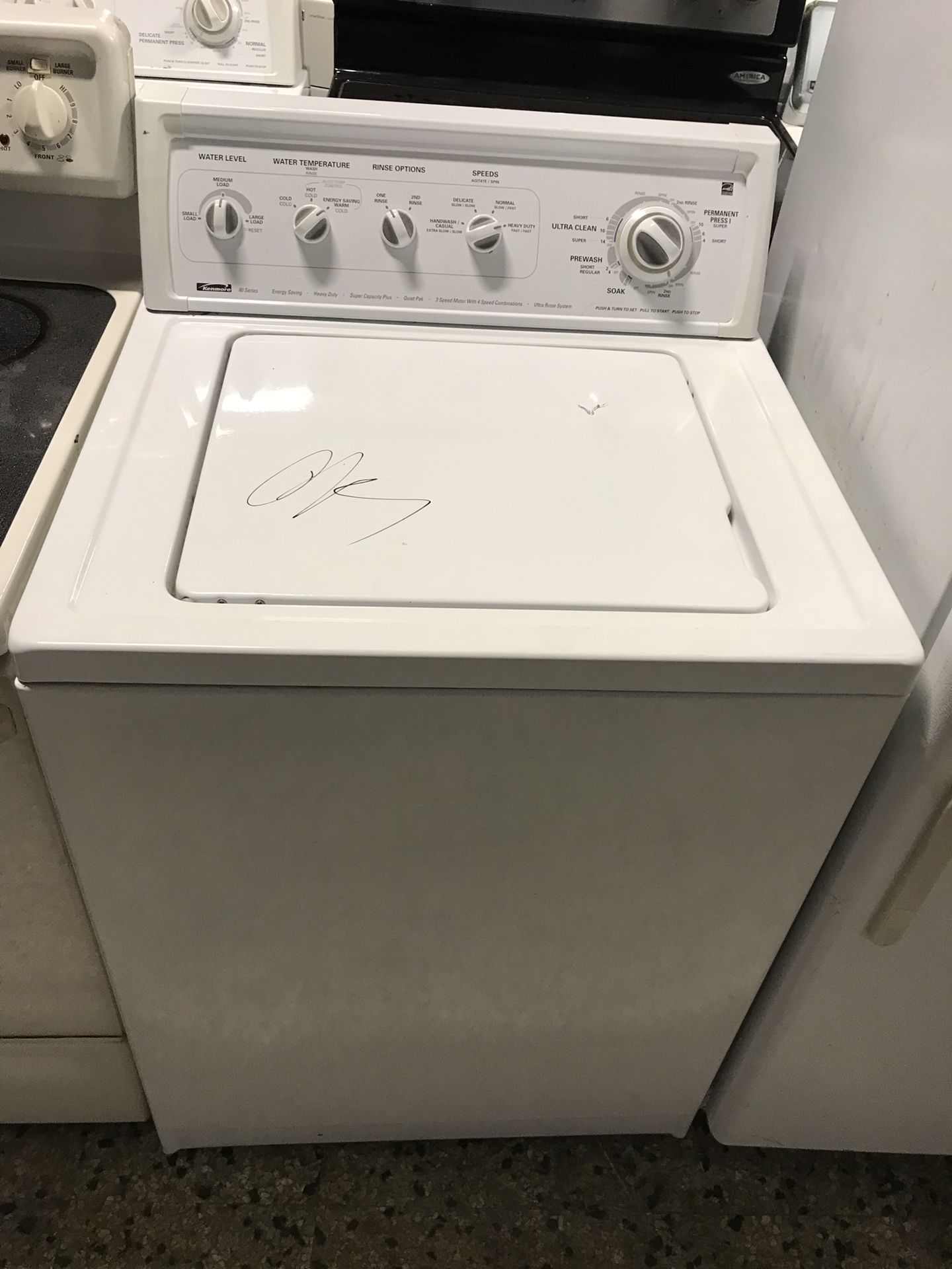Kenmore brand refurbished top washer works great.