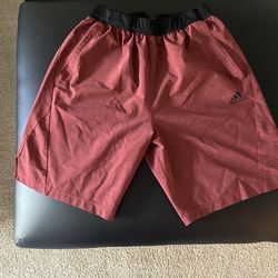 Adidas Mens Medium Work out shorts. Lightly used, in great condition. Both zipper pockets work have no issues.