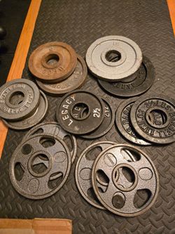 Used 2.5lb and 5lb Olympic Weight Plates