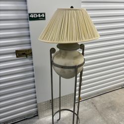 Iron and ceramic clay pot standing lamp.., 61” high , 20” wide , $50