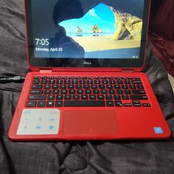Red Dell, notebook laptop.
