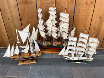 3 wooden model ships