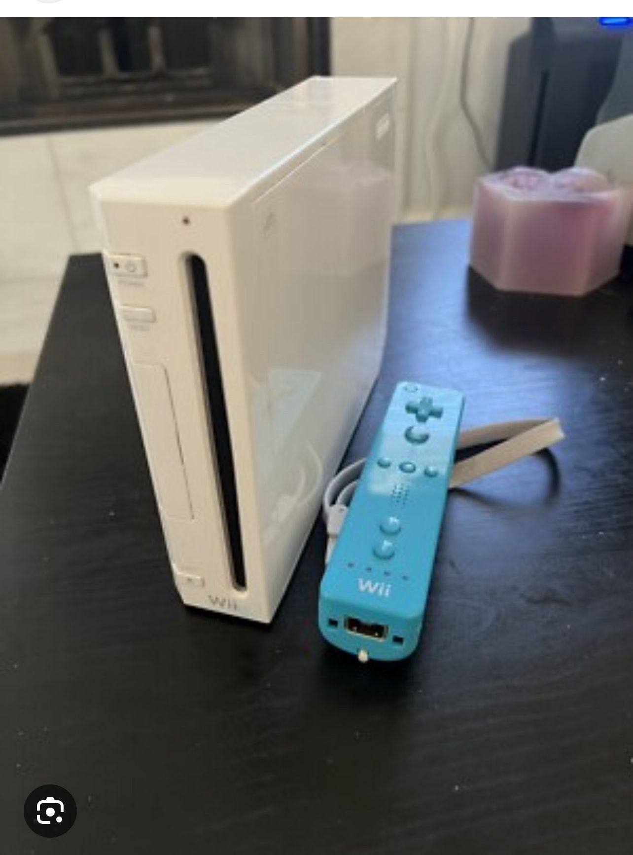 USED WII WITH 10 Games /1control ($80)