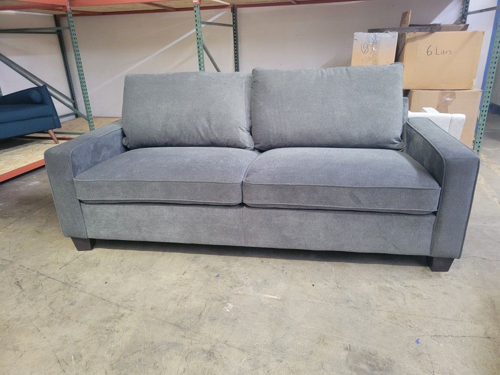 Living Spaces Reid Sofa -grey with wood legs